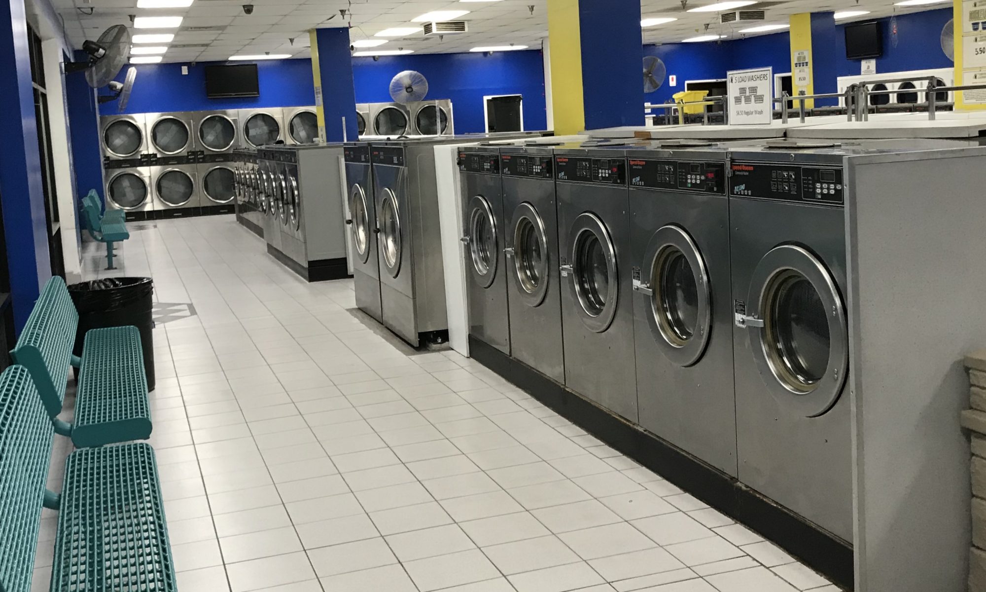 Corner View of Centre Laundry's 90 washers and 60 dryers - never wait to get your laundry done!